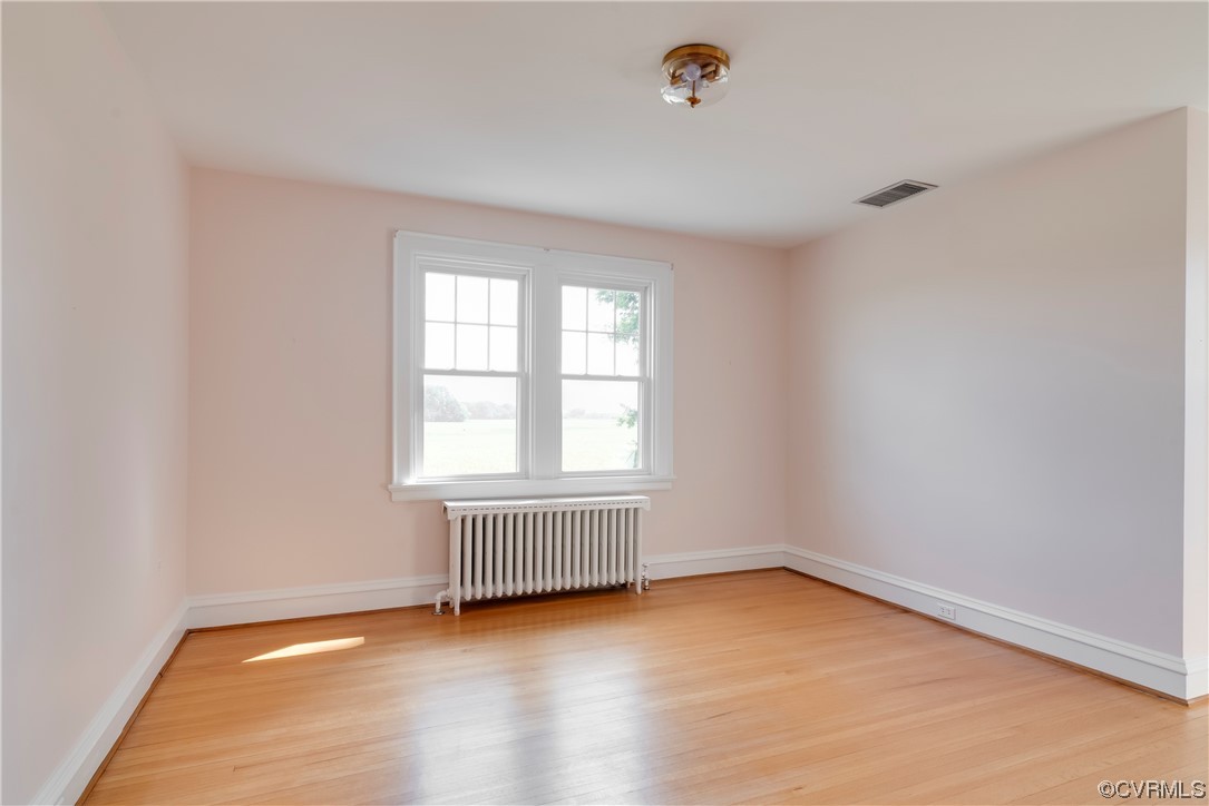 1700 Midview Road Henrico, VA 23231 - Photo 44 of 50 an empty room with wooden floor and windows