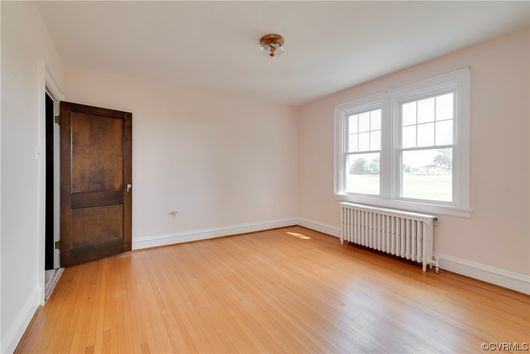 1700 Midview Road Henrico, VA 23231 - Photo 46 of 50 an empty room with wooden floor and windows