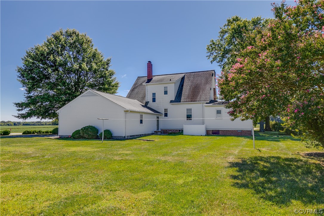 1700 Midview Road Henrico, VA 23231 - Photo 5 of 50 a view of a house with a big yard and large trees