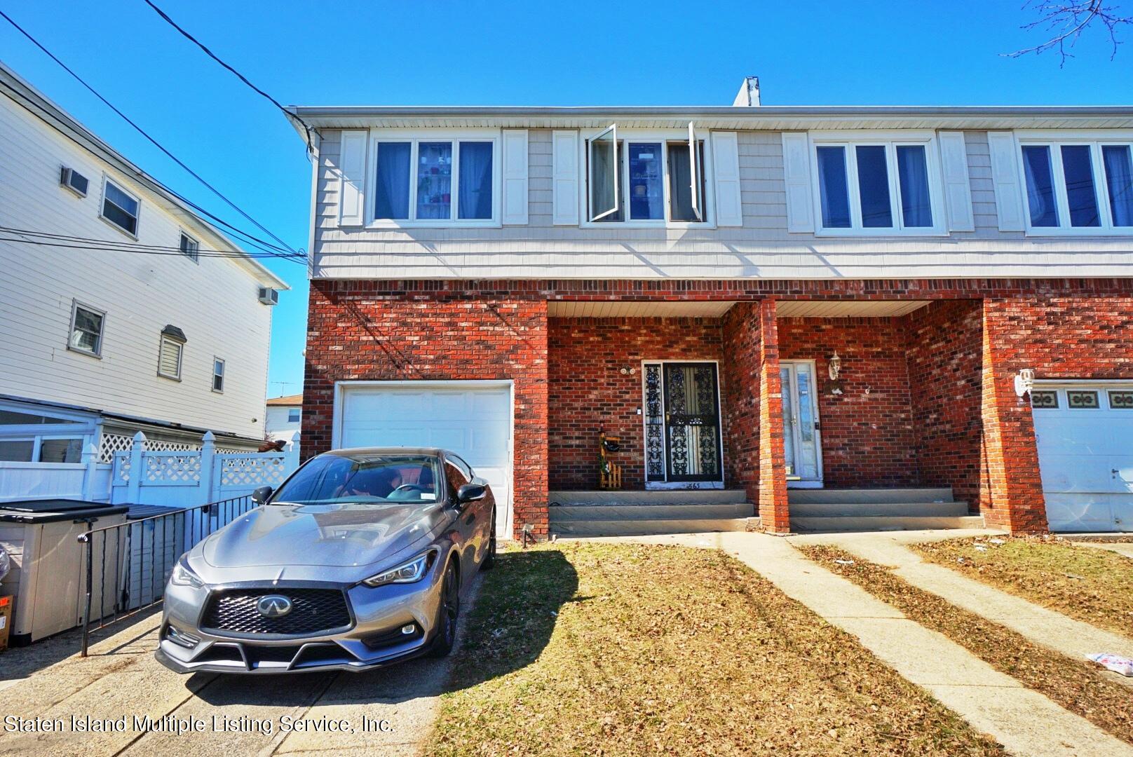 563 Mill Road Staten Island, NY 10306 - Photo 1 of 32 a house view with a outdoor space