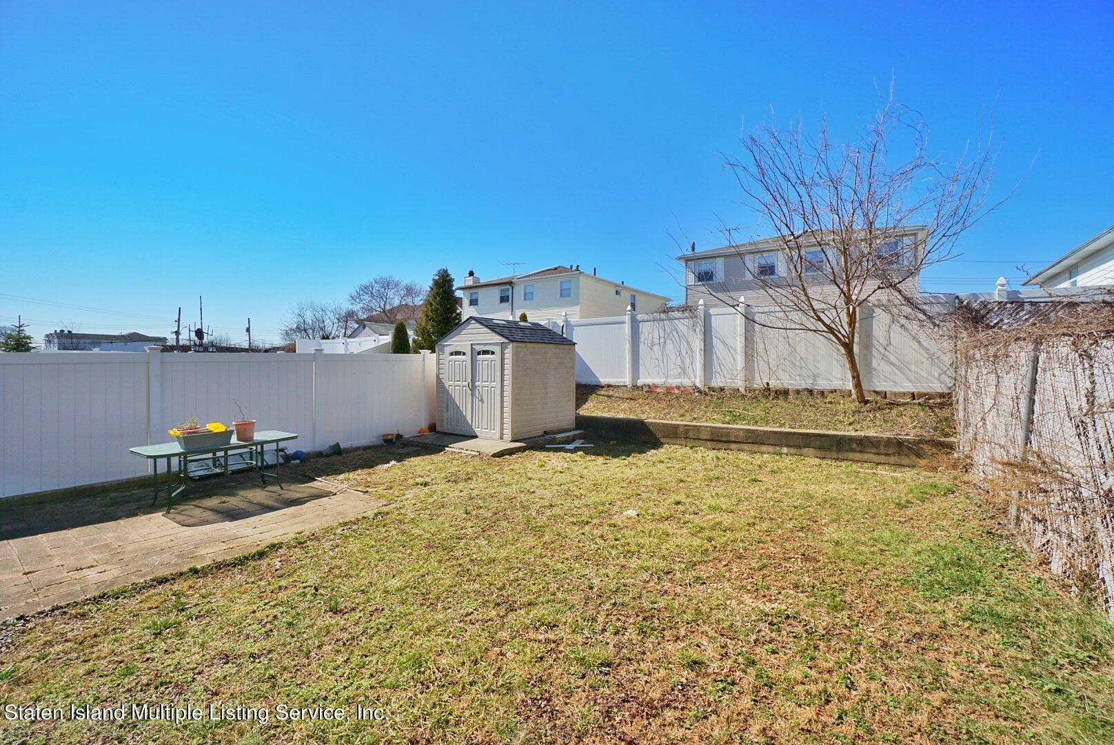 563 Mill Road Staten Island, NY 10306 - Photo 32 of 32 a backyard of a house