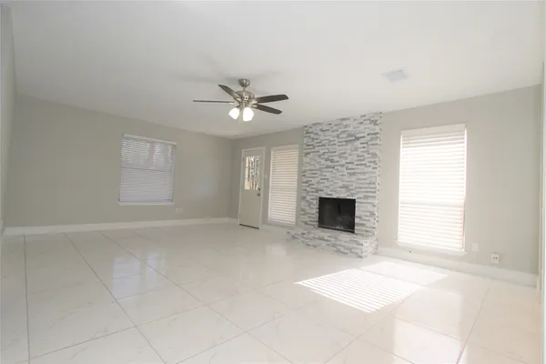 a view of a livingroom with a kitchen