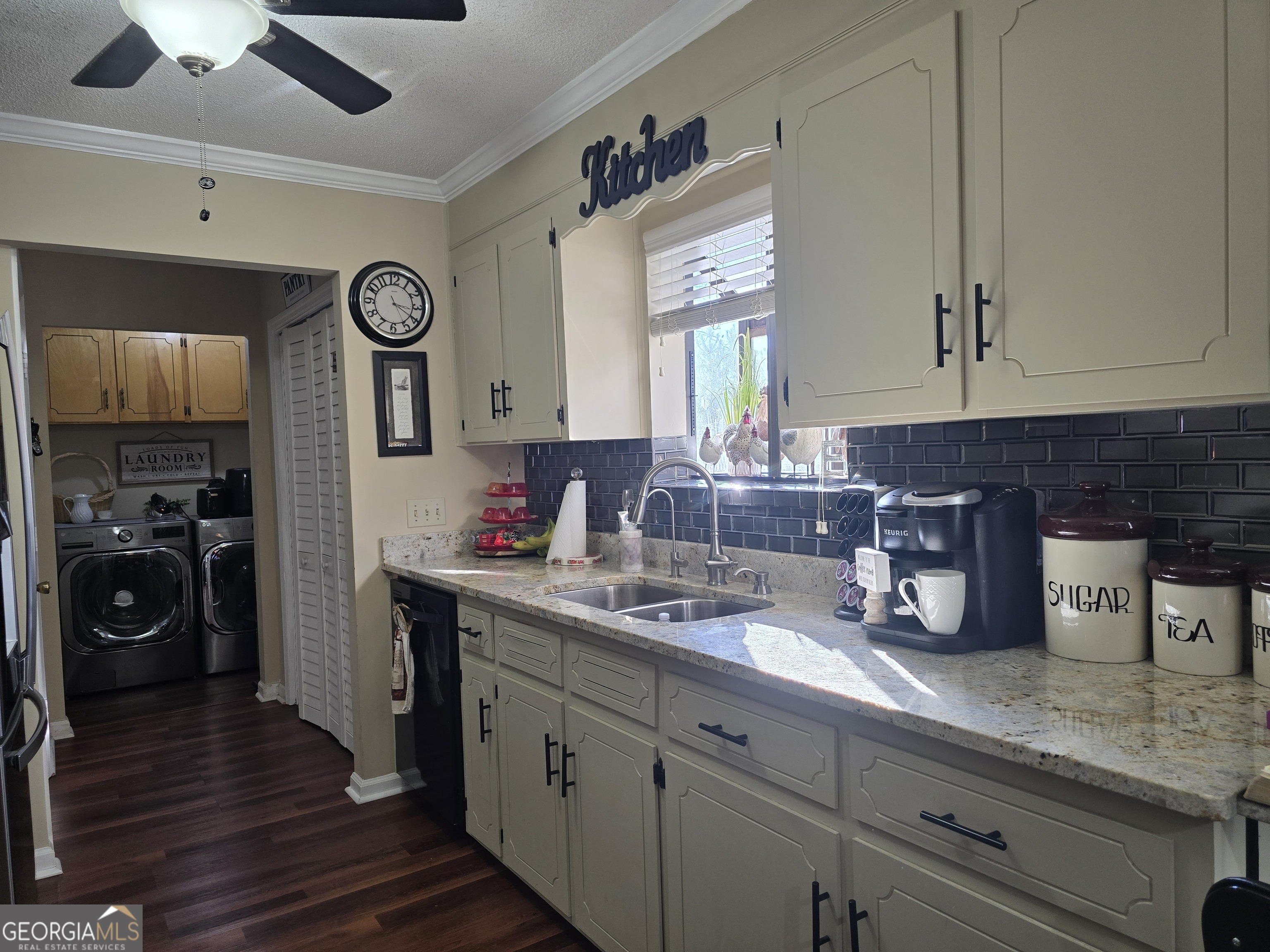479 Mitchell Loop Bluffton, GA 39824 - Photo 12 of 51 a kitchen with sink and cabinets