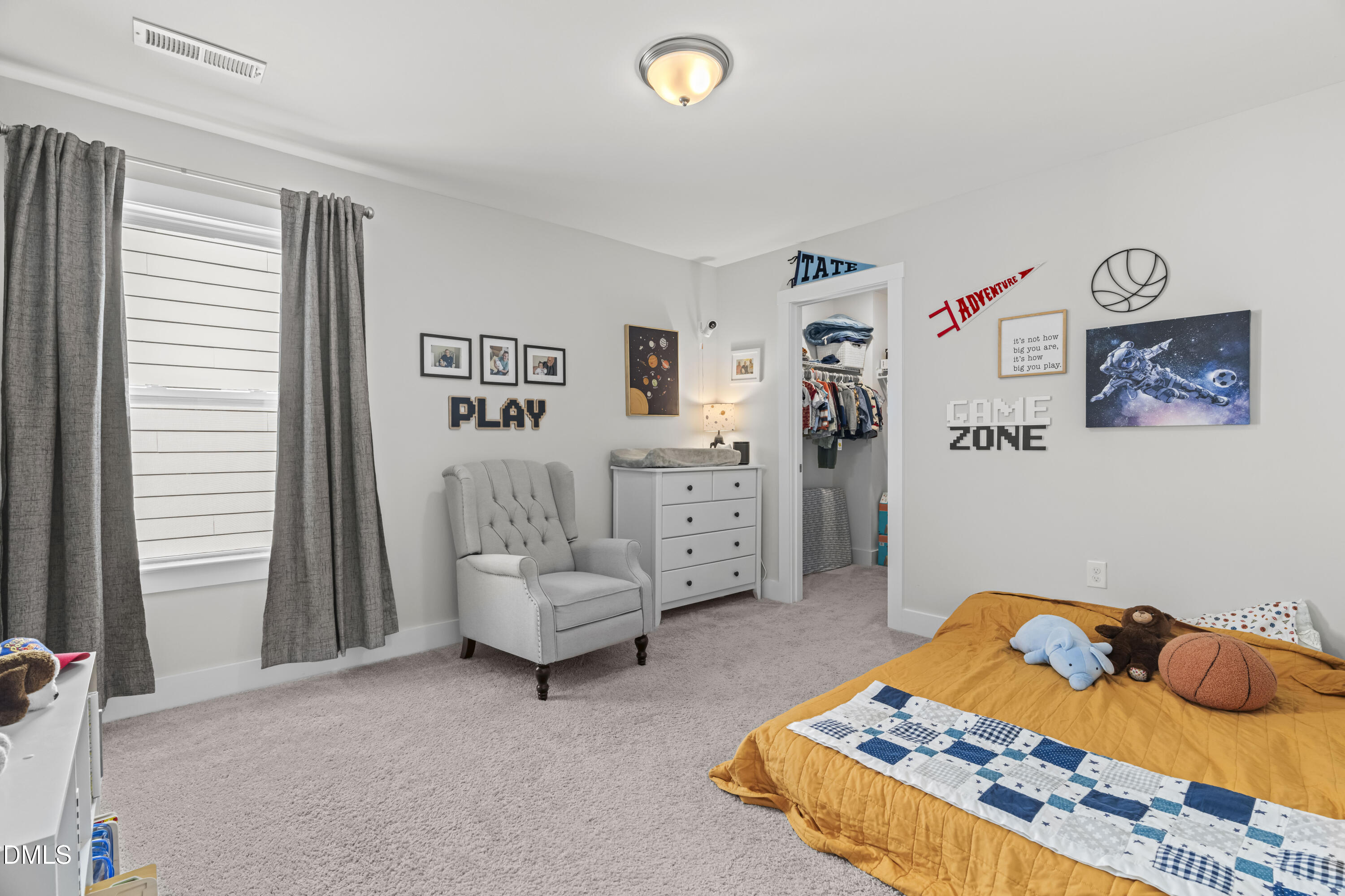 108 Bridge Street Smithfield, NC 27577 - Photo 29 of 48 a bedroom with a bed and a couch