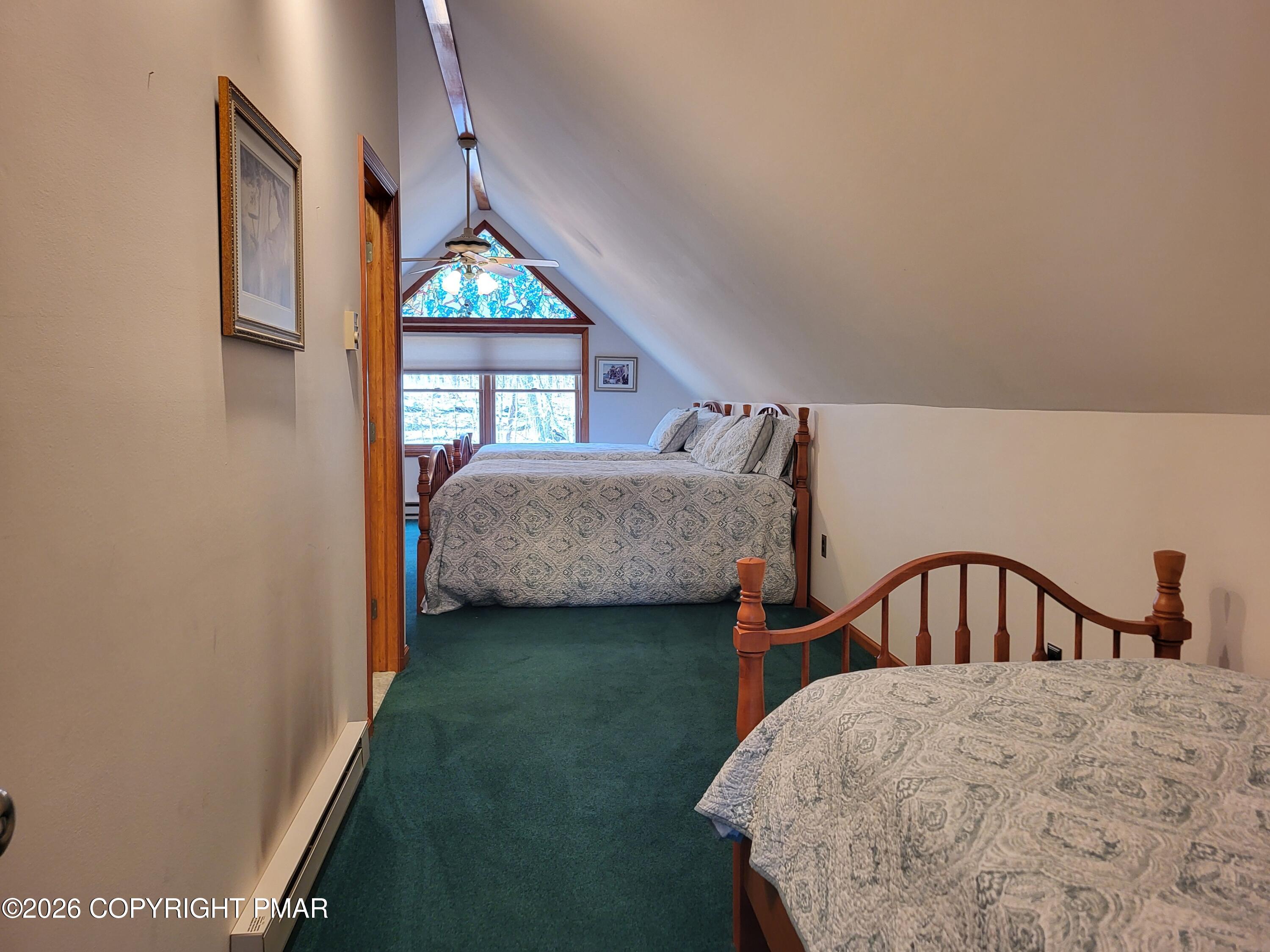 155 Clifton Drive Bushkill, PA 18324 - Photo 35 of 75 a bedroom with bed and a window