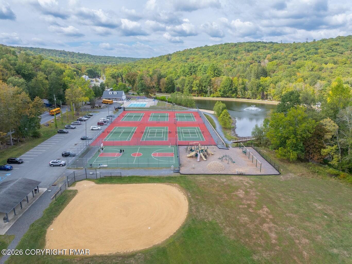 155 Clifton Drive Bushkill, PA 18324 - Photo 68 of 75 a view of outdoor space swimming pool and outdoor seating