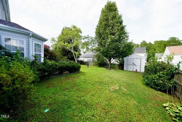 a house view with a garden space