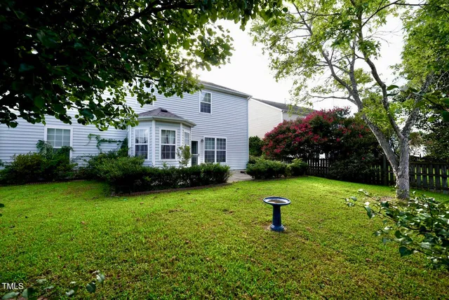 a house view with a garden space