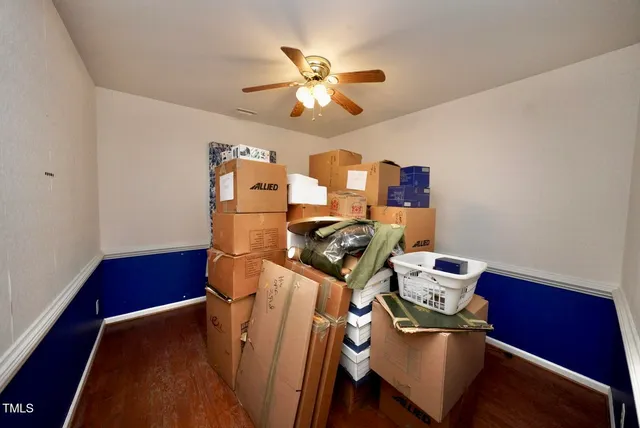 a workspace with furniture and screen