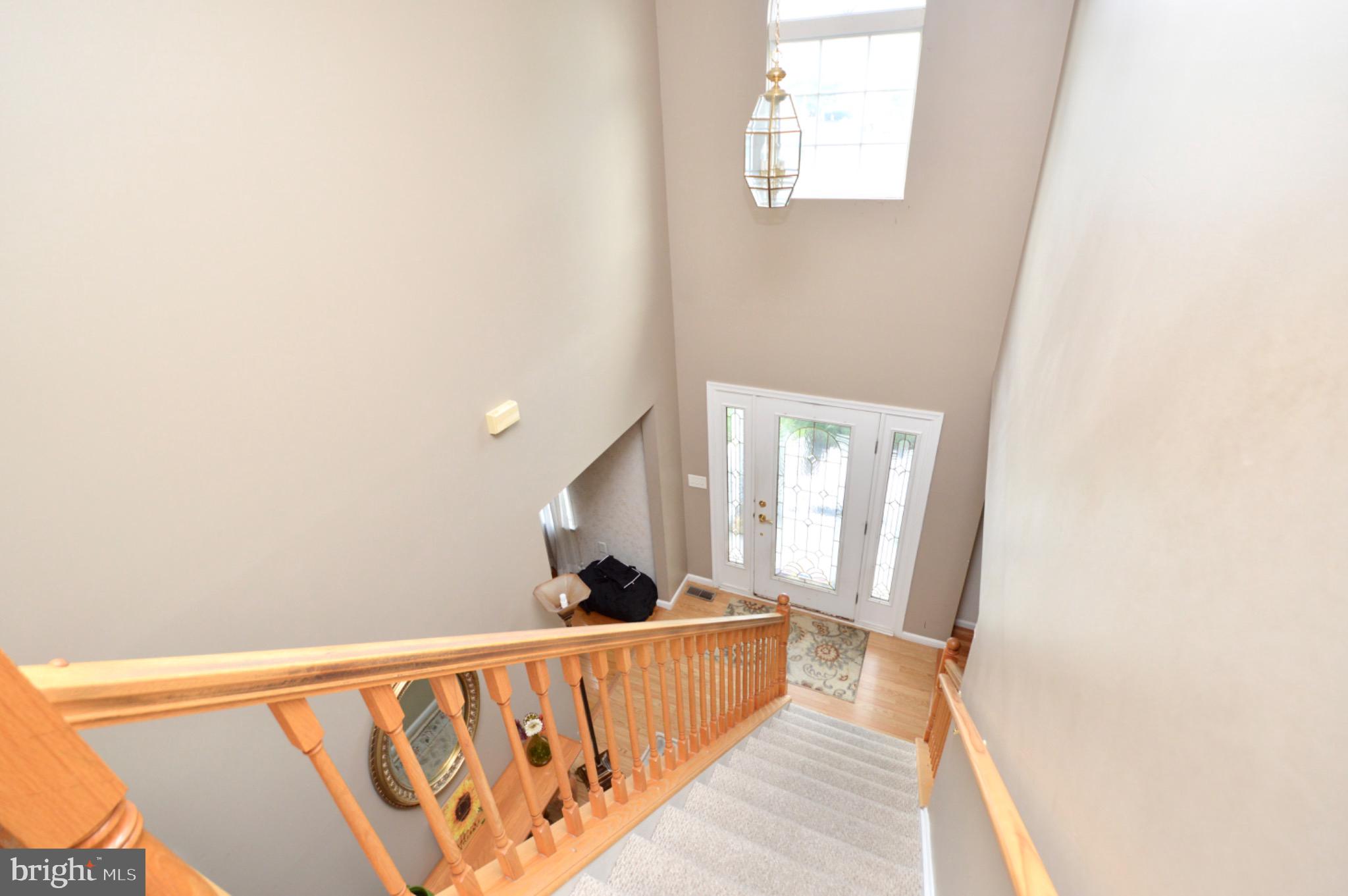 8 Toby Wells Court Delran, NJ 08075 - Photo 11 of 23 a view of a hallway with windows