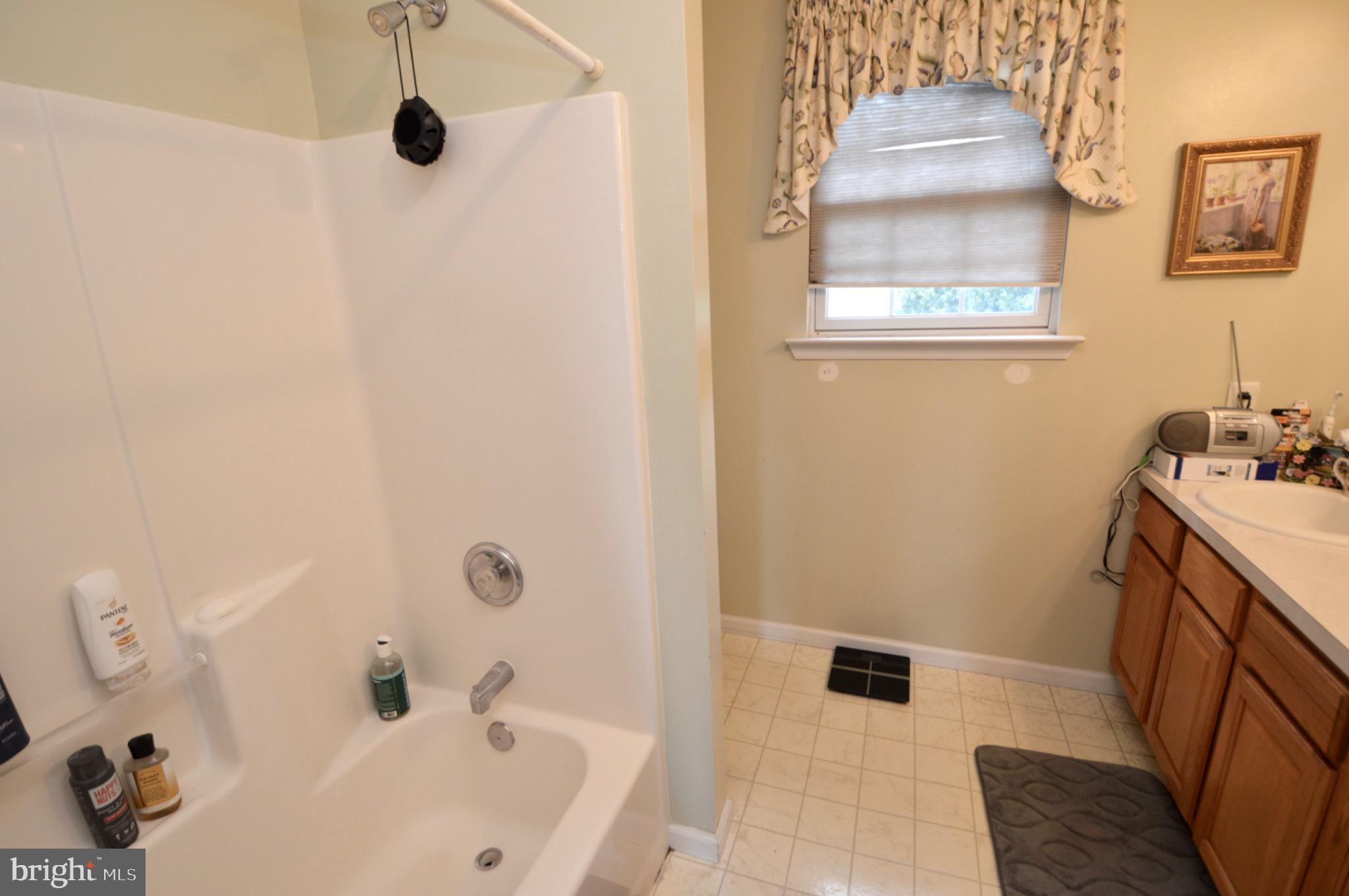 8 Toby Wells Court Delran, NJ 08075 - Photo 17 of 23 a bathroom with a sink a toilet and shower