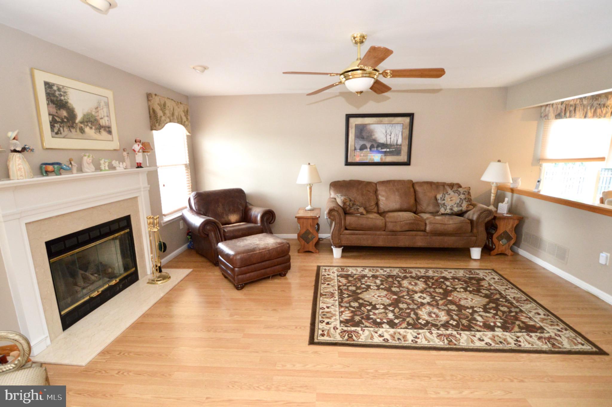 8 Toby Wells Court Delran, NJ 08075 - Photo 4 of 23 a living room with furniture and a fireplace