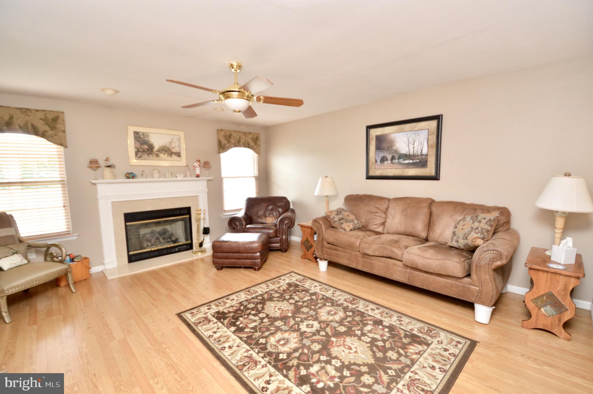 8 Toby Wells Court Delran, NJ 08075 - Photo 5 of 23 a living room with furniture and a fireplace
