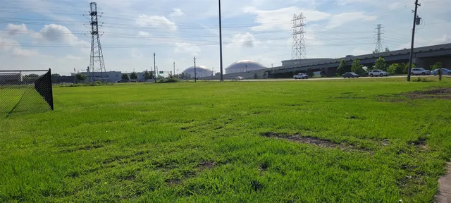 a view of a building and a yard