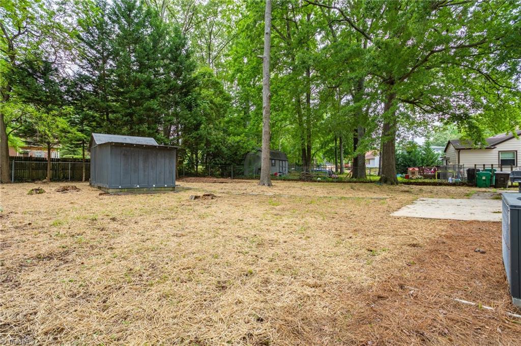 1712 Bolingbroke Road High Point, NC 27265 - Photo 22 of 23 A second view of the large back yard.