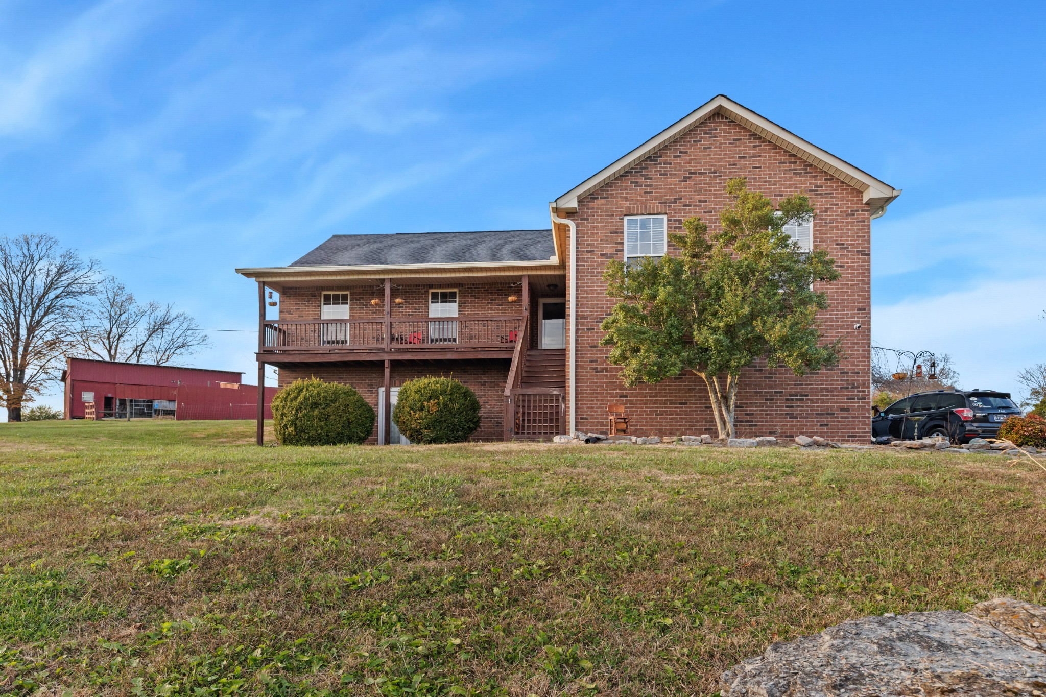 699 Puckett Road Watertown, TN 37184 - Photo 1 of 53 a front view of a house with a yard