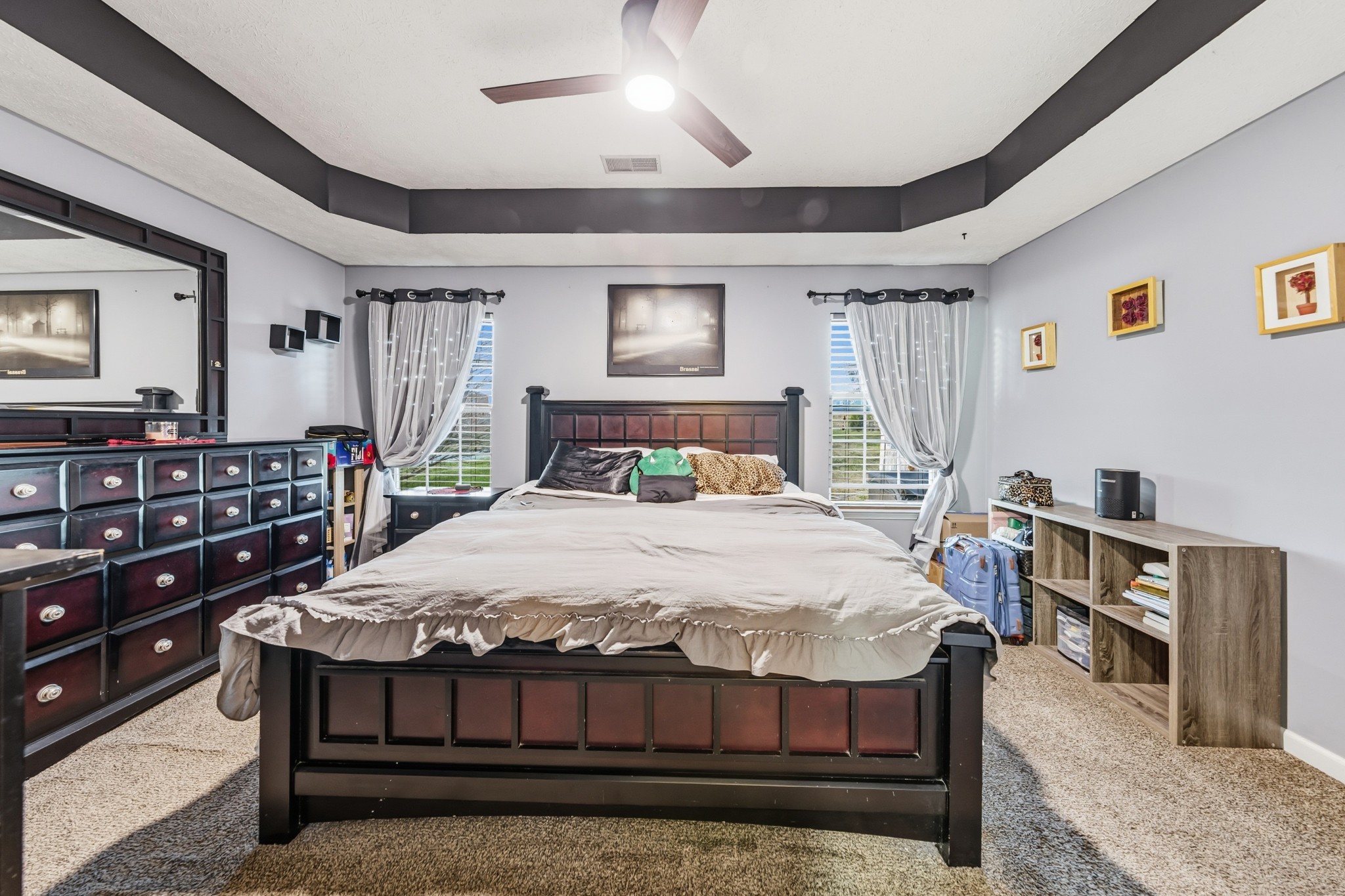 699 Puckett Road Watertown, TN 37184 - Photo 13 of 53 a bedroom with a bed a dresser and book shelf