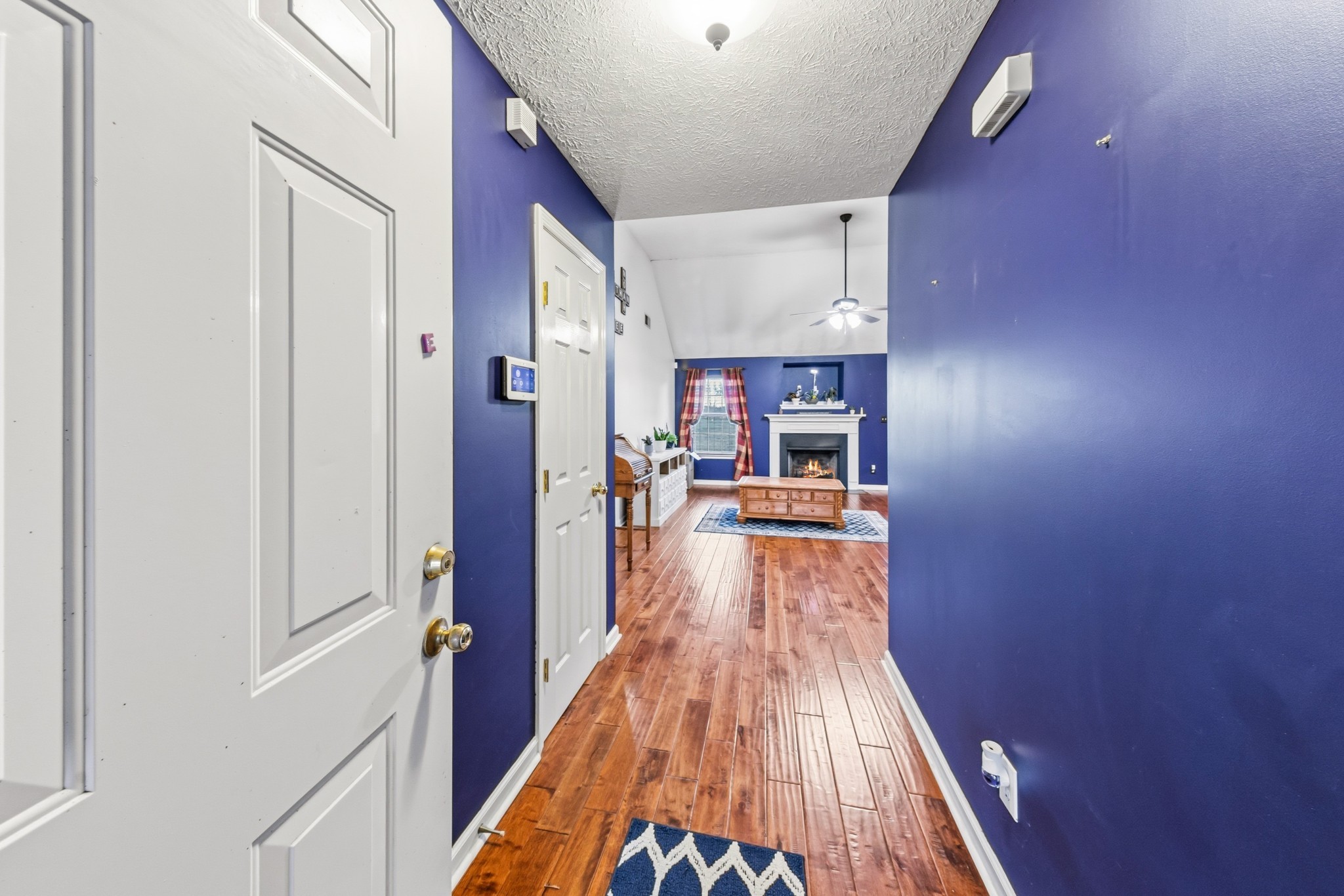 699 Puckett Road Watertown, TN 37184 - Photo 2 of 53 a view of a hallway with wooden floor and furniture