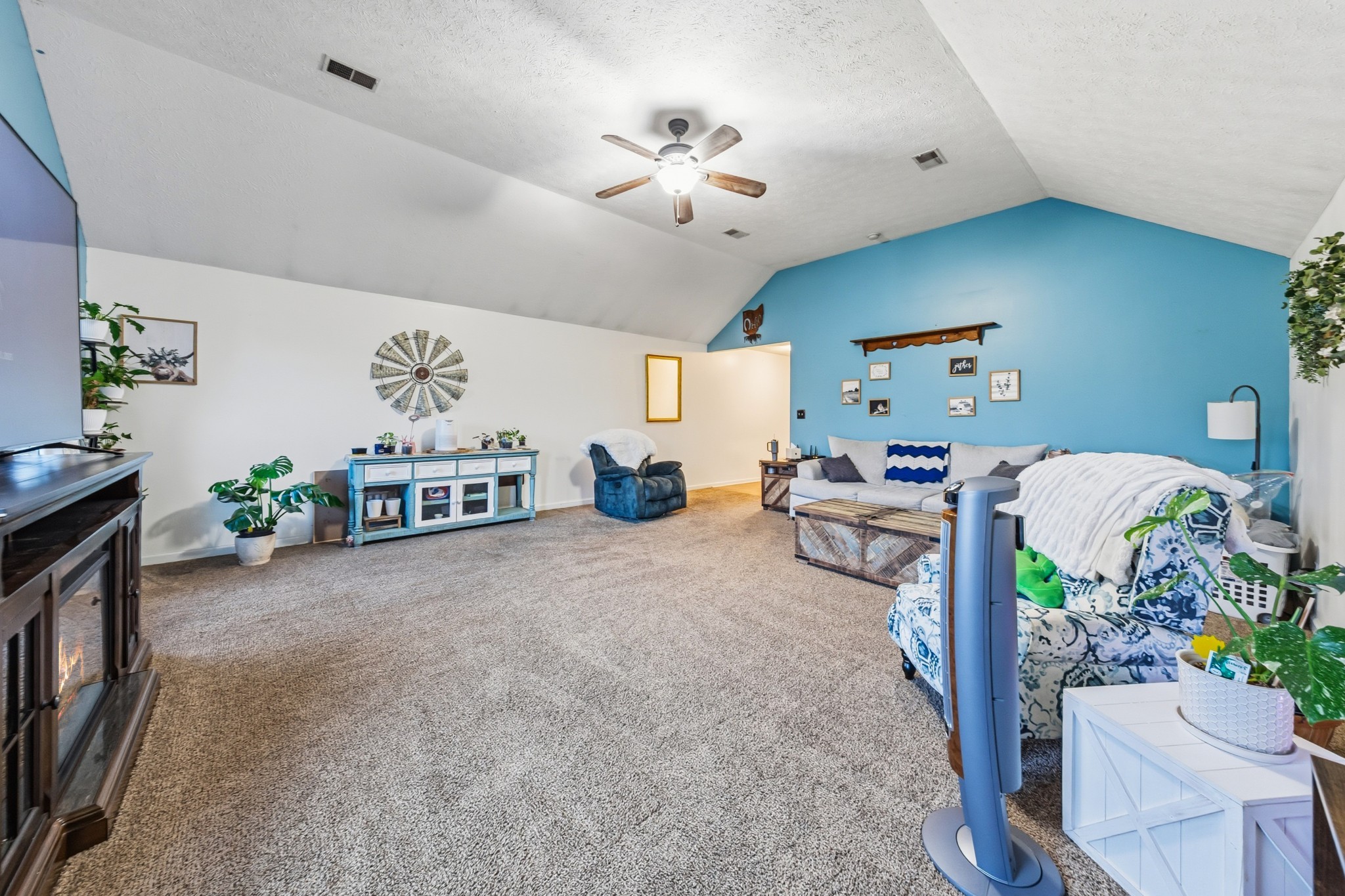 699 Puckett Road Watertown, TN 37184 - Photo 26 of 53 a living room with furniture and a chandelier