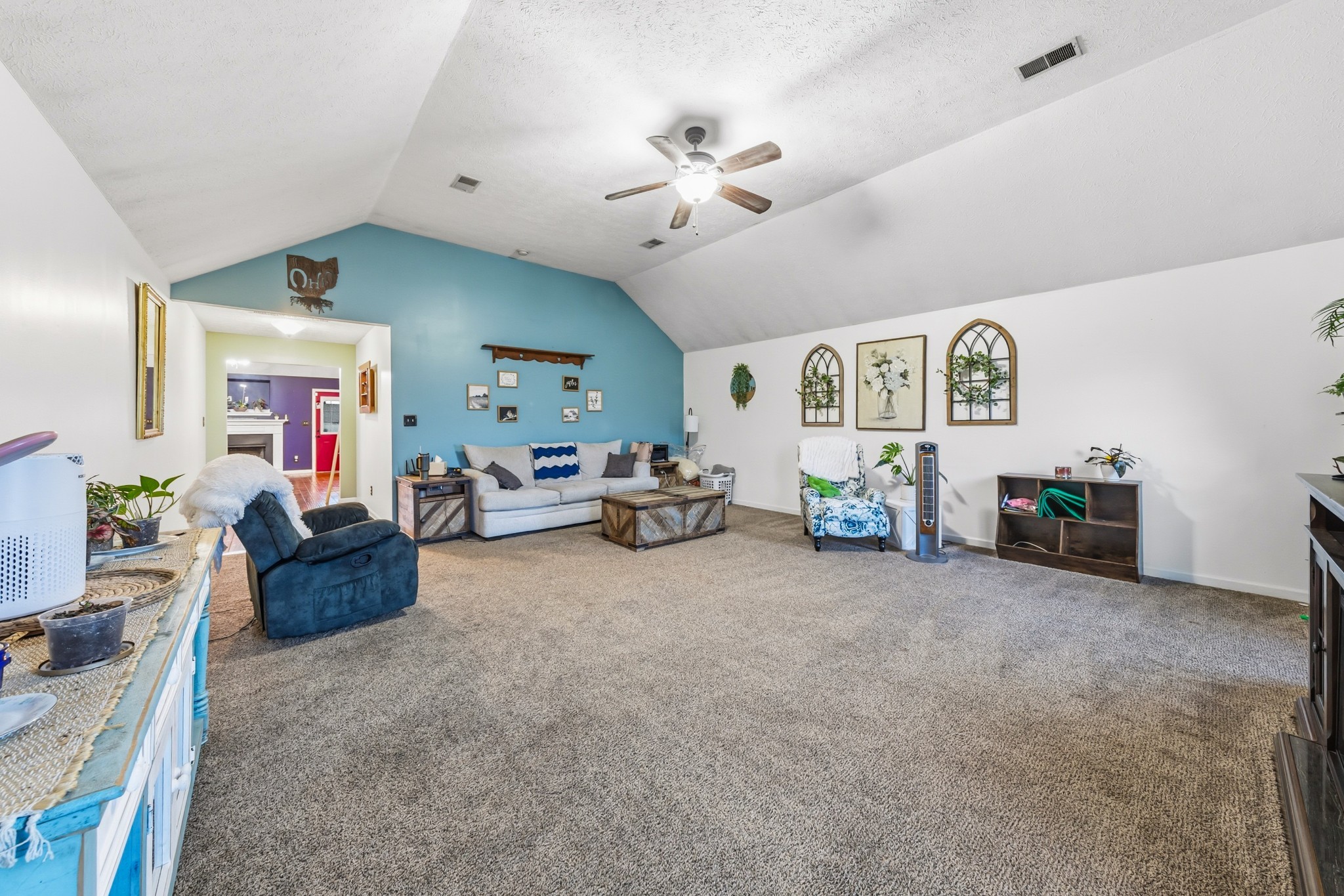 699 Puckett Road Watertown, TN 37184 - Photo 27 of 53 a living room with furniture and a chandelier