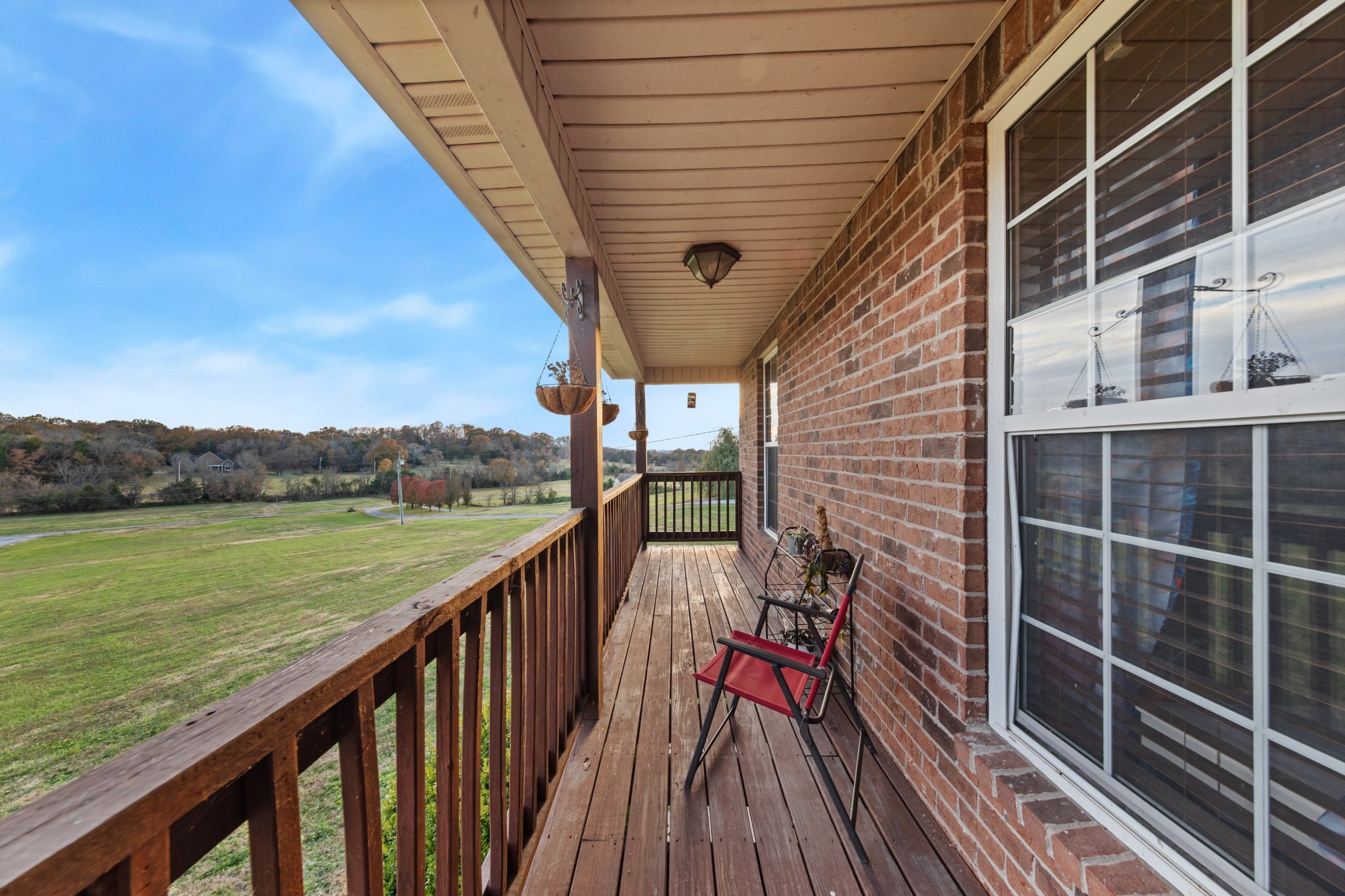 699 Puckett Road Watertown, TN 37184 - Photo 44 of 53 a view of balcony with wooden floor and lake view