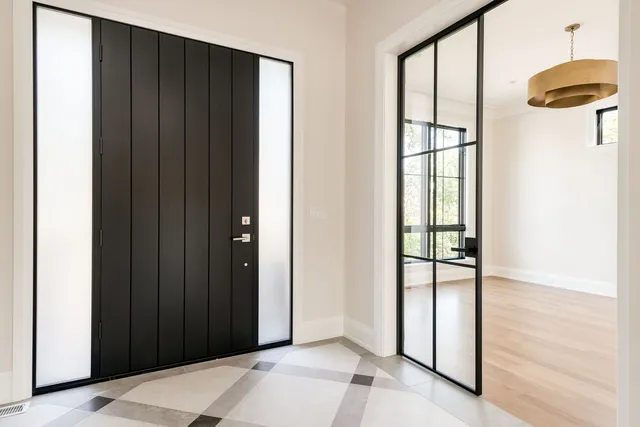 a view of a mirror and window in a room