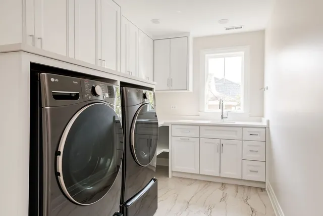 a view of a hallway with wooden floor and stairs