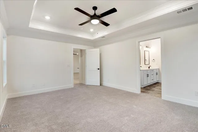 a bathroom with double vanity sink and a mirror