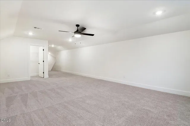 a bathroom with a sink a toilet and vanity