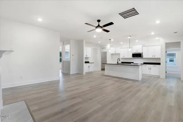 a large kitchen with cabinets