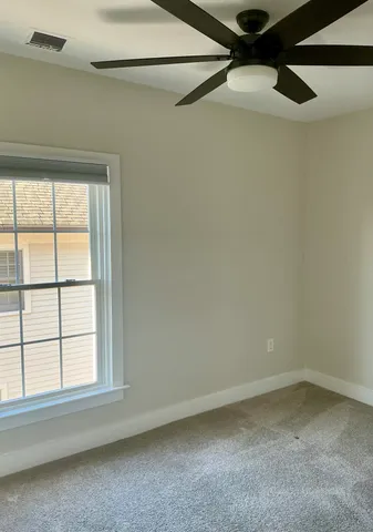 a view of a window in an empty room