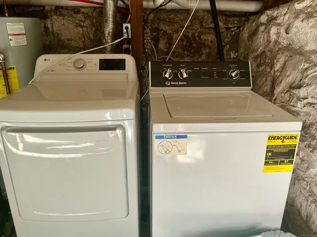 a utility room with dryer and washer