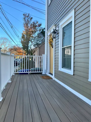 a view of outdoor space with deck and wooden floor