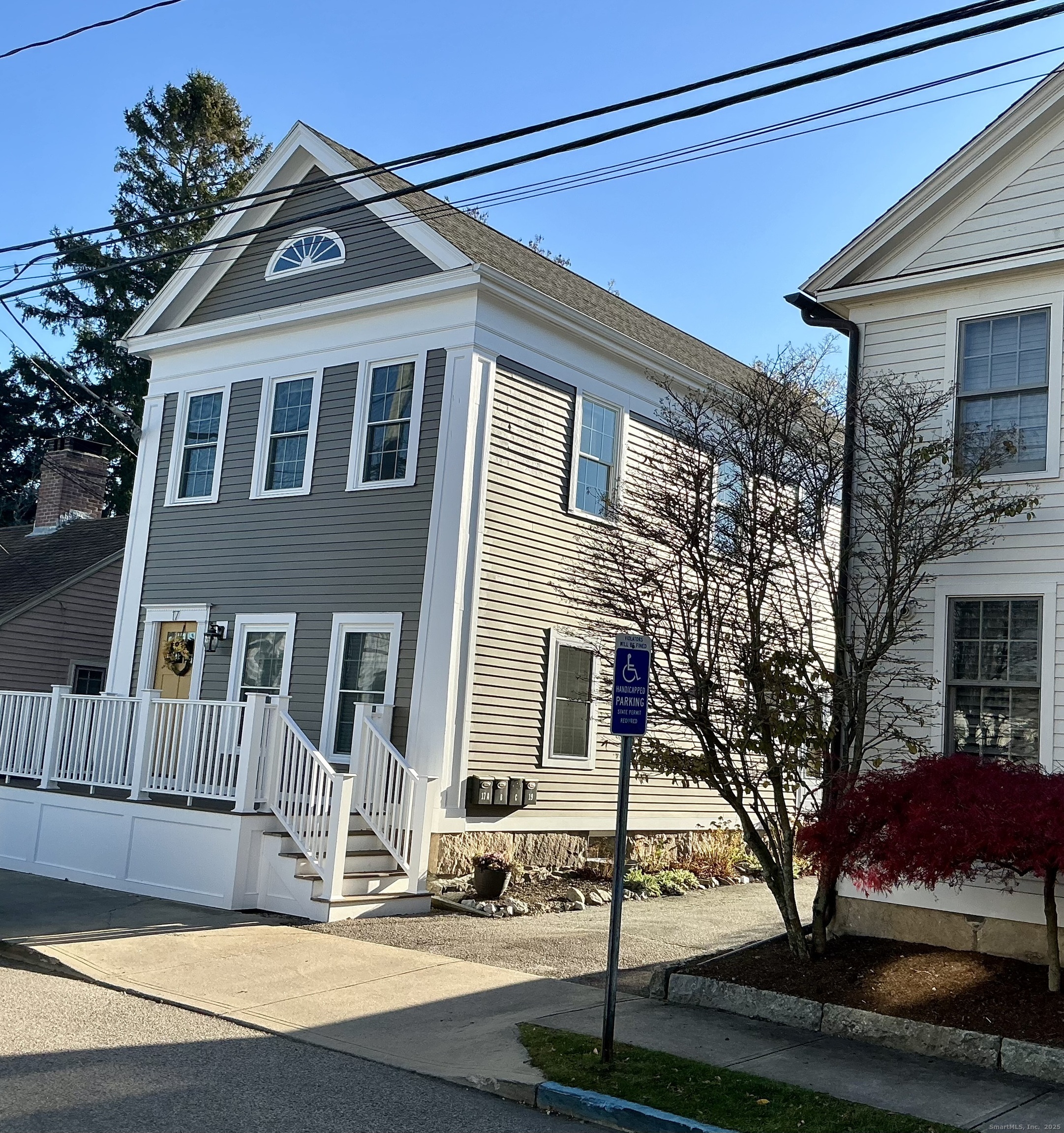 17 Willow Street, Unit 2 Mystic, CT 06355 - Photo 20 of 20 a front view of a house with garden