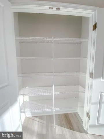 a view of a room with shelves