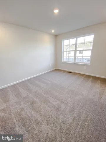 a bathroom with a sink toilet a mirror and shower
