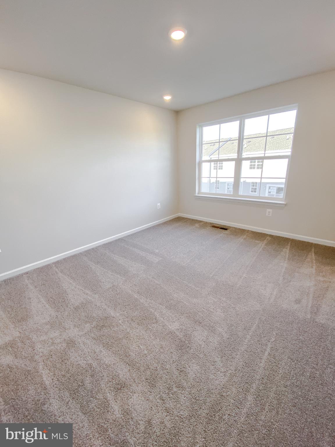 141 Canning Road Inwood, WV 25428 - Photo 20 of 29 an empty room with a window