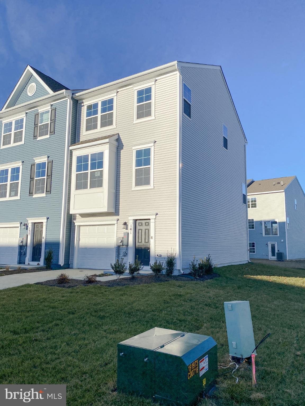 141 Canning Road Inwood, WV 25428 - Photo 2 of 29 a front view of a house with a yard table and chairs