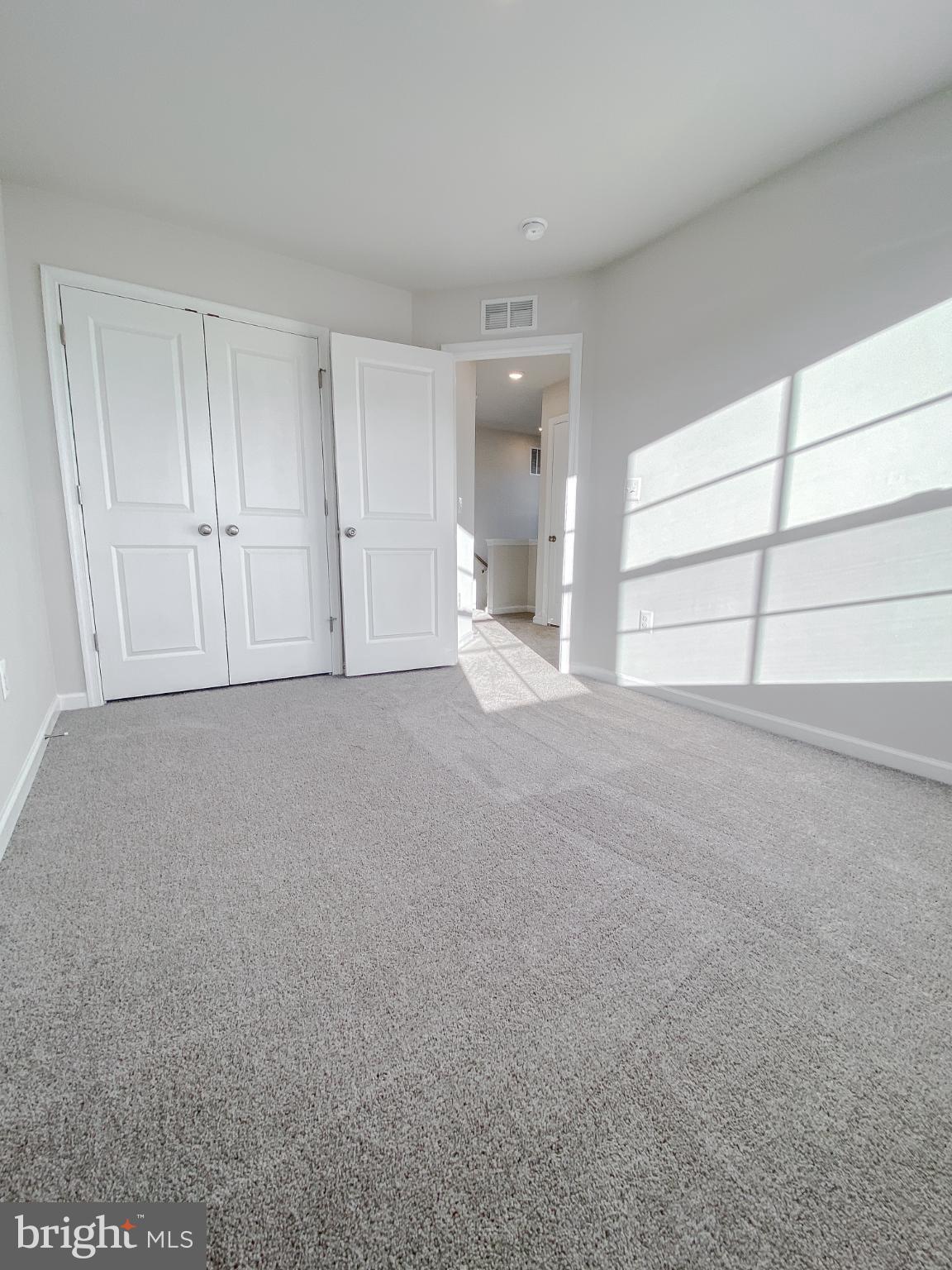 141 Canning Road Inwood, WV 25428 - Photo 27 of 29 a view of an empty room with a window