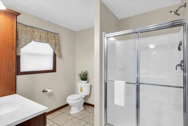 a bathroom with a sink a vanity and a mirror