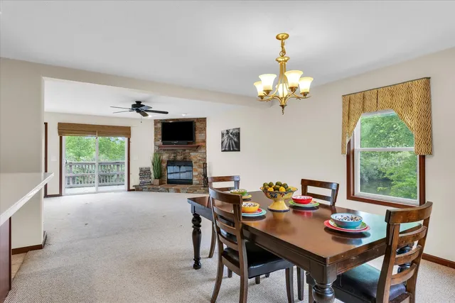 a kitchen with stainless steel appliances granite countertop a refrigerator stove and sink