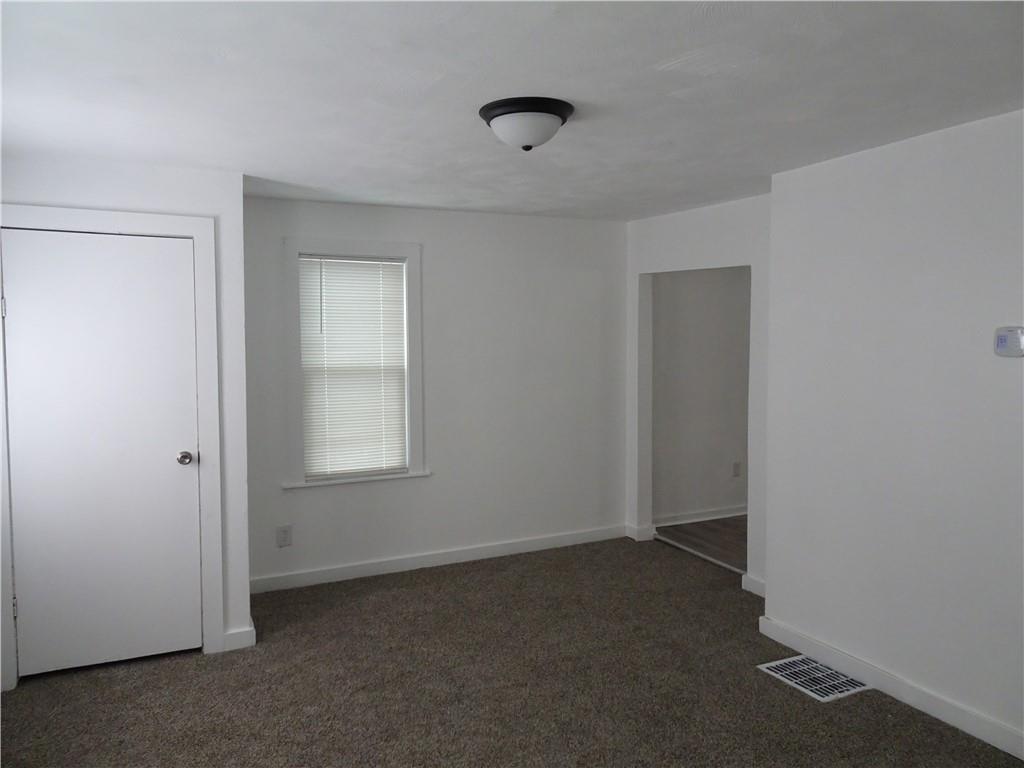42 Oak Street Manor, PA 15665 - Photo 16 of 39 a view of an empty room with a window