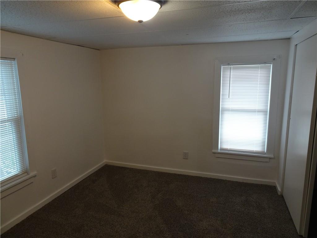 42 Oak Street Manor, PA 15665 - Photo 32 of 39 an empty room with a window