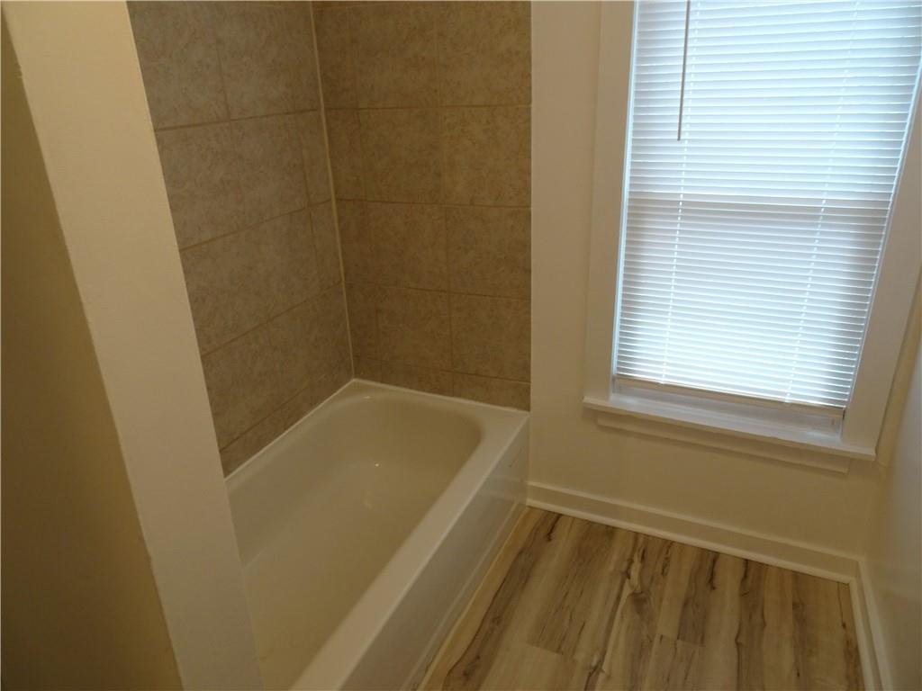 42 Oak Street Manor, PA 15665 - Photo 38 of 39 a bathroom with a tub