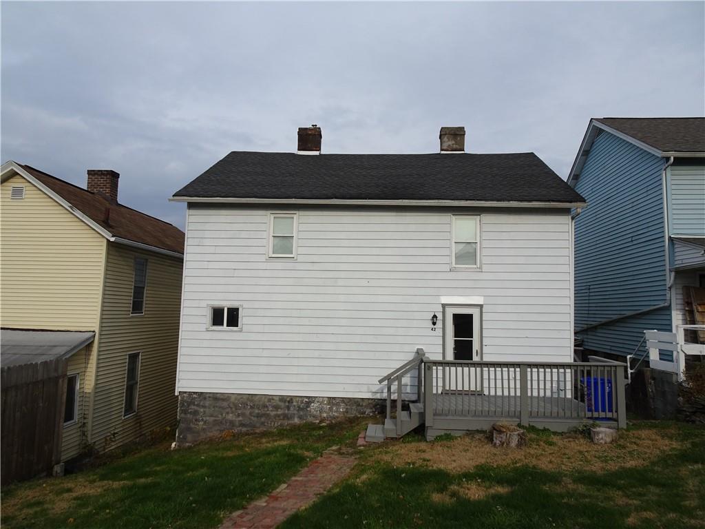 42 Oak Street Manor, PA 15665 - Photo 5 of 39 a view of house with a yard