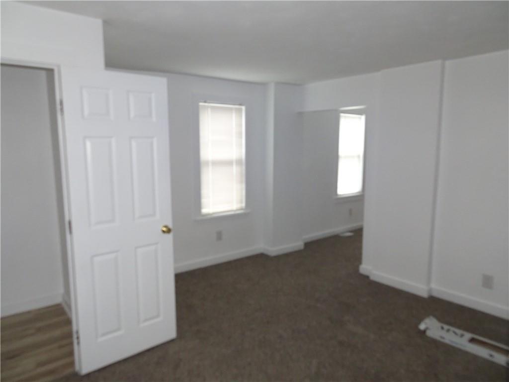 42 Oak Street Manor, PA 15665 - Photo 10 of 39 a view of an empty room with closet and a window