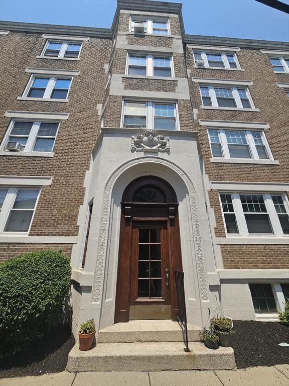 5 Colliston Road, Unit 7 Boston, MA 02135 - Photo 1 of 1 a front view of a building