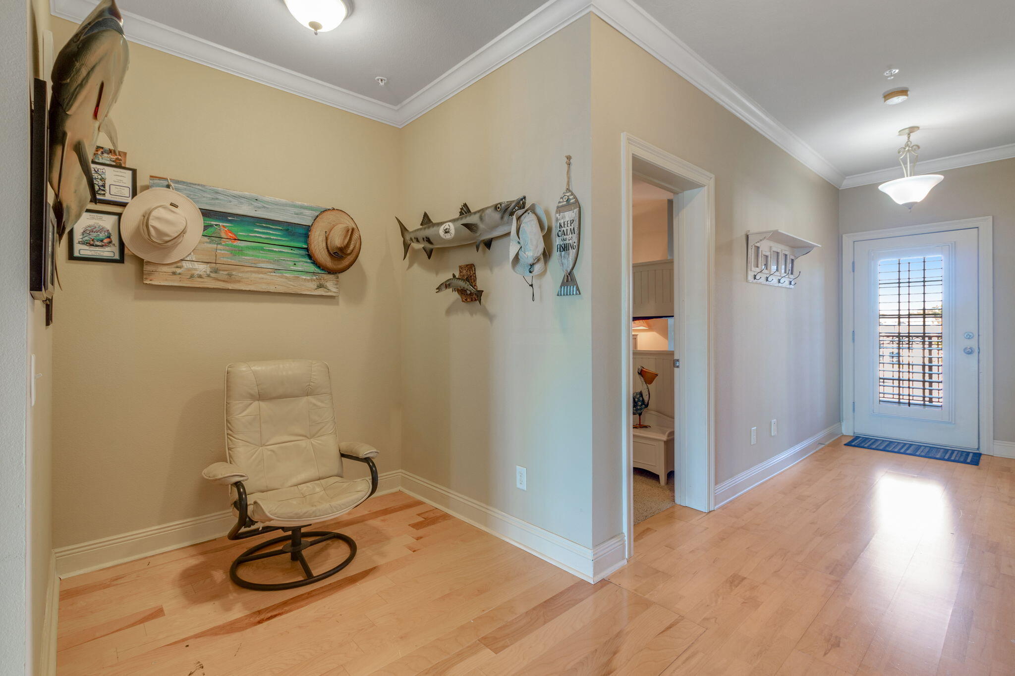 724 Harbor Boulevard, Unit 201 Destin, FL 32541 - Photo 15 of 25 a view of entryway with wooden floor