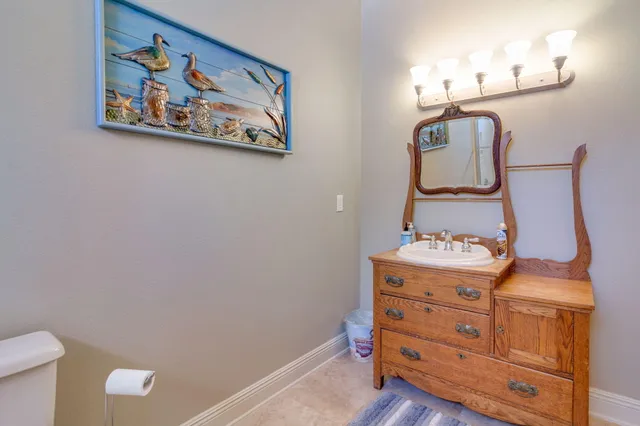 a bedroom with a bed and a cabinets