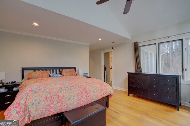 a bed room with a bed and a dresser